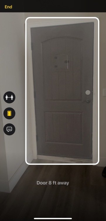 A screenshot of an iPhone detecting a brown door that is 8 feet away from the user.
