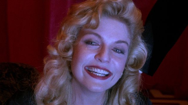Laura Palmer gives a pained smile in Twin Peaks: Fire Walk with Me