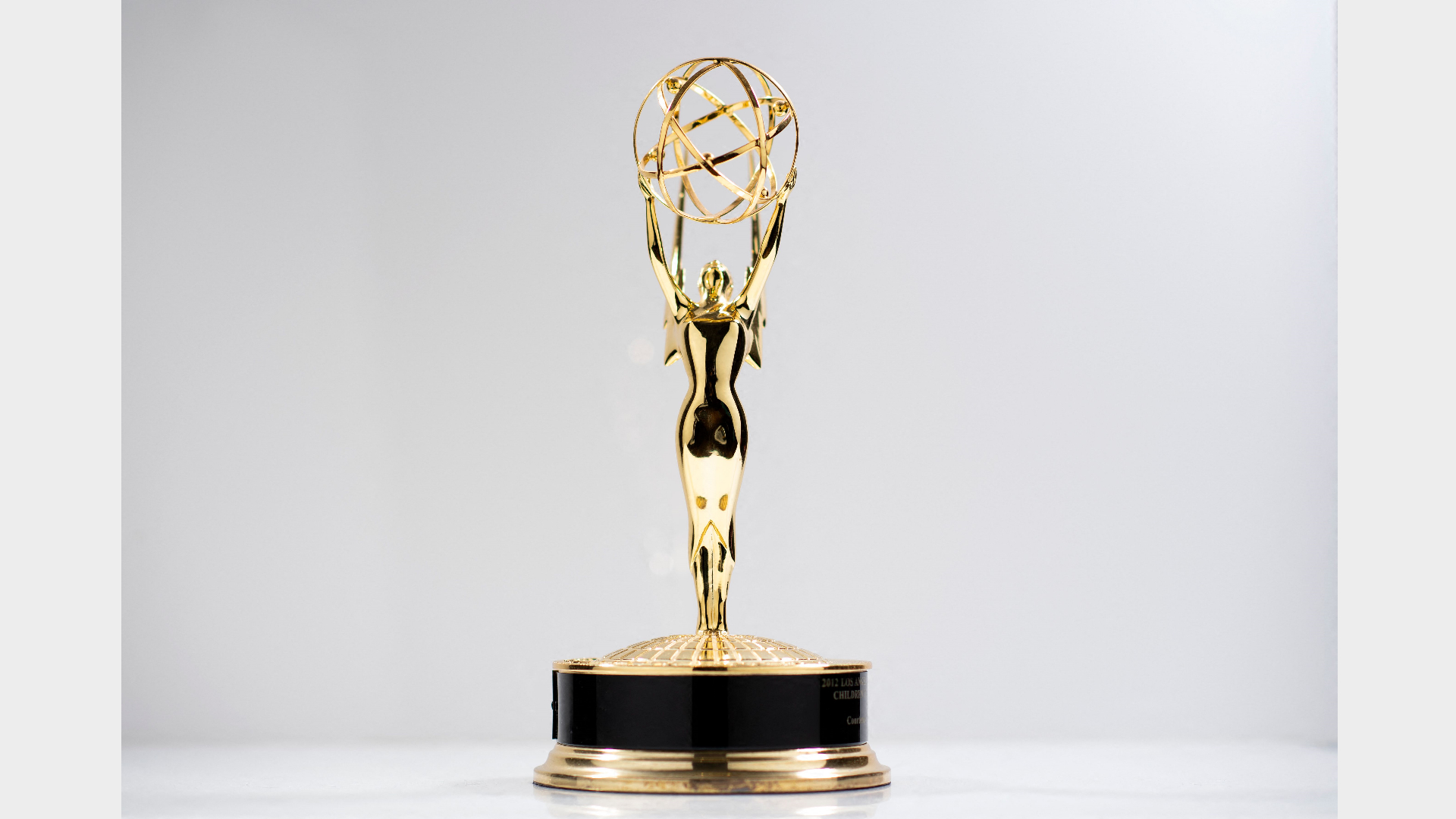 An Emmy award statue.