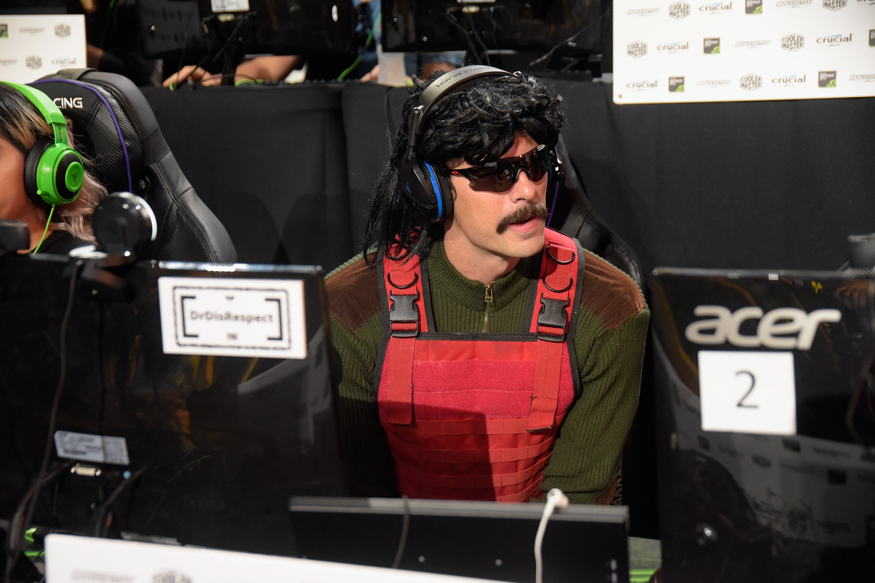 Gamer Dr DisRespect gets interviewed at the Twitch Prime and PUBG Battlegrounds Squad Showdown gaming event on July 13, 2018 in Los Angeles, California