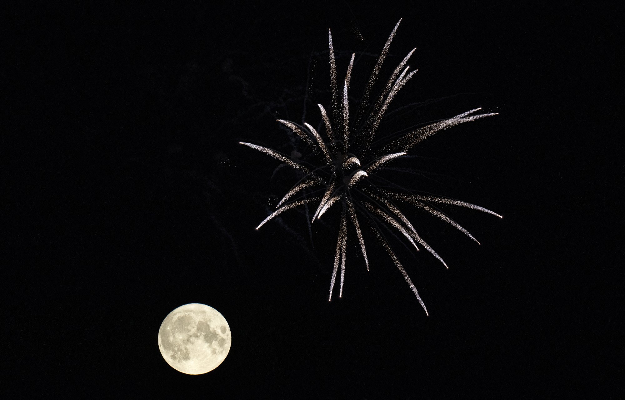 The Sturgeon Moon with fireworks