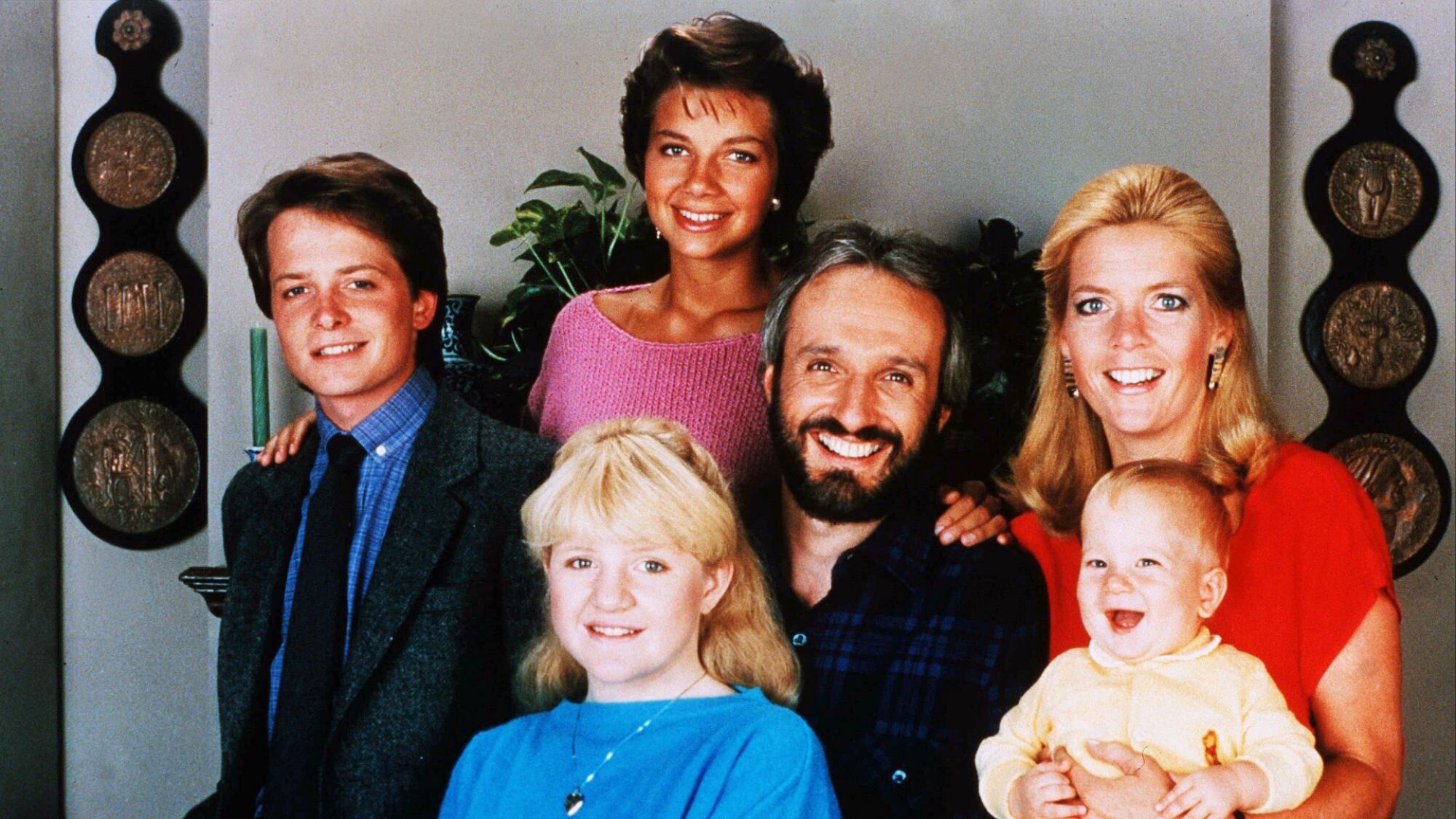 Michael J. Fox, Justine Bateman, Michael Gross, Meredith Baxter Birney, and Tina Yothers in "Family Ties"