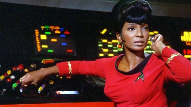 Lt. Nyota Uhura informs Capt. Kirk a hailing frequency has opened