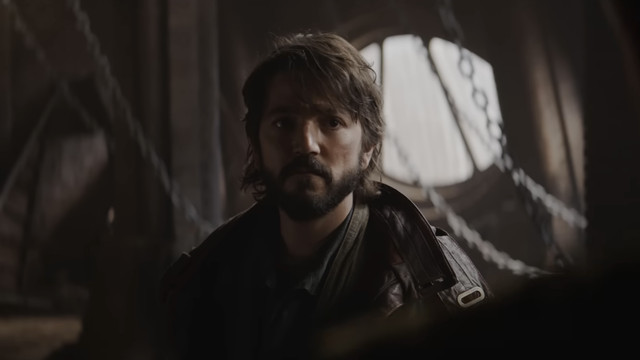 Diego Luna as Cassian Andor looking solemn at someone