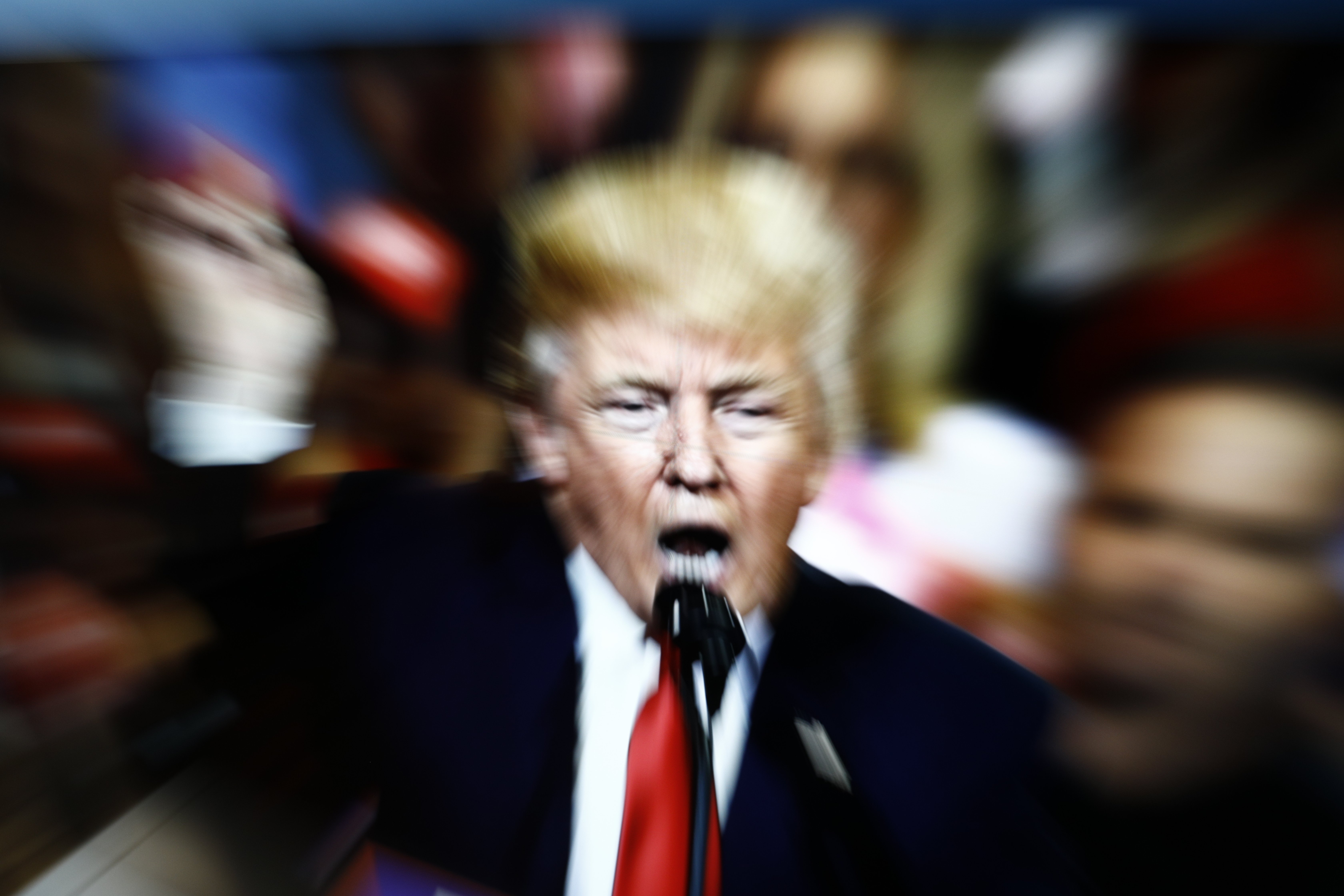 distorted photo of Donald Trump yelling
