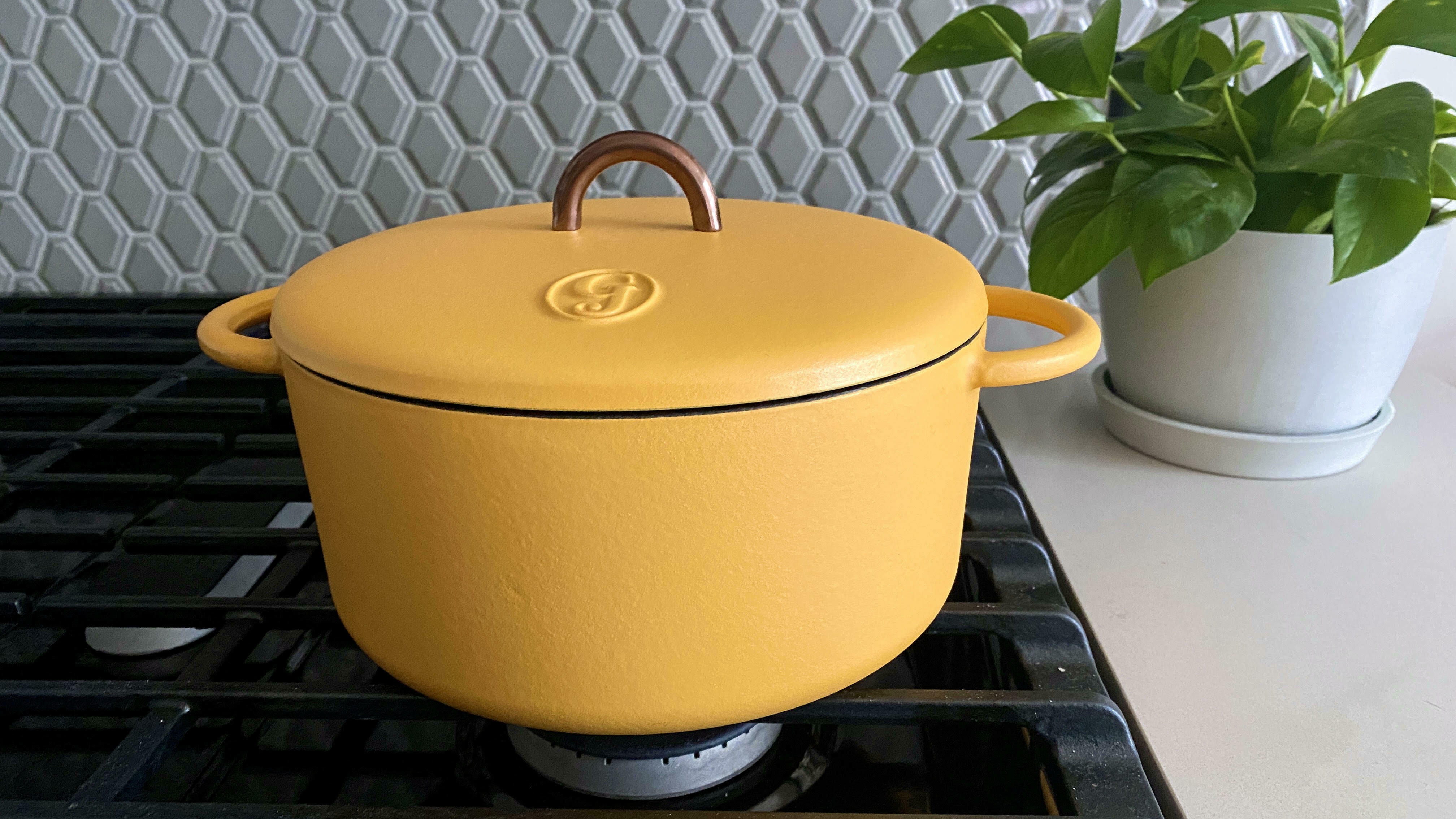 Yellow dutch oven on a stove