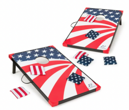 Two American flag patterned cornhole boards with matching beanbags