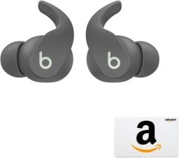 Gray earbuds next to an Amazon gift card
