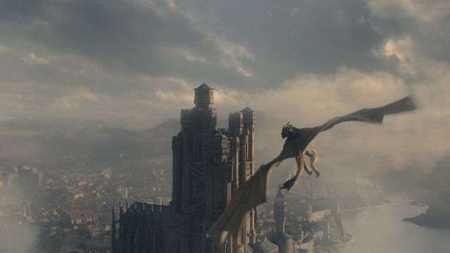 A dragon flying over a Game of Thrones city