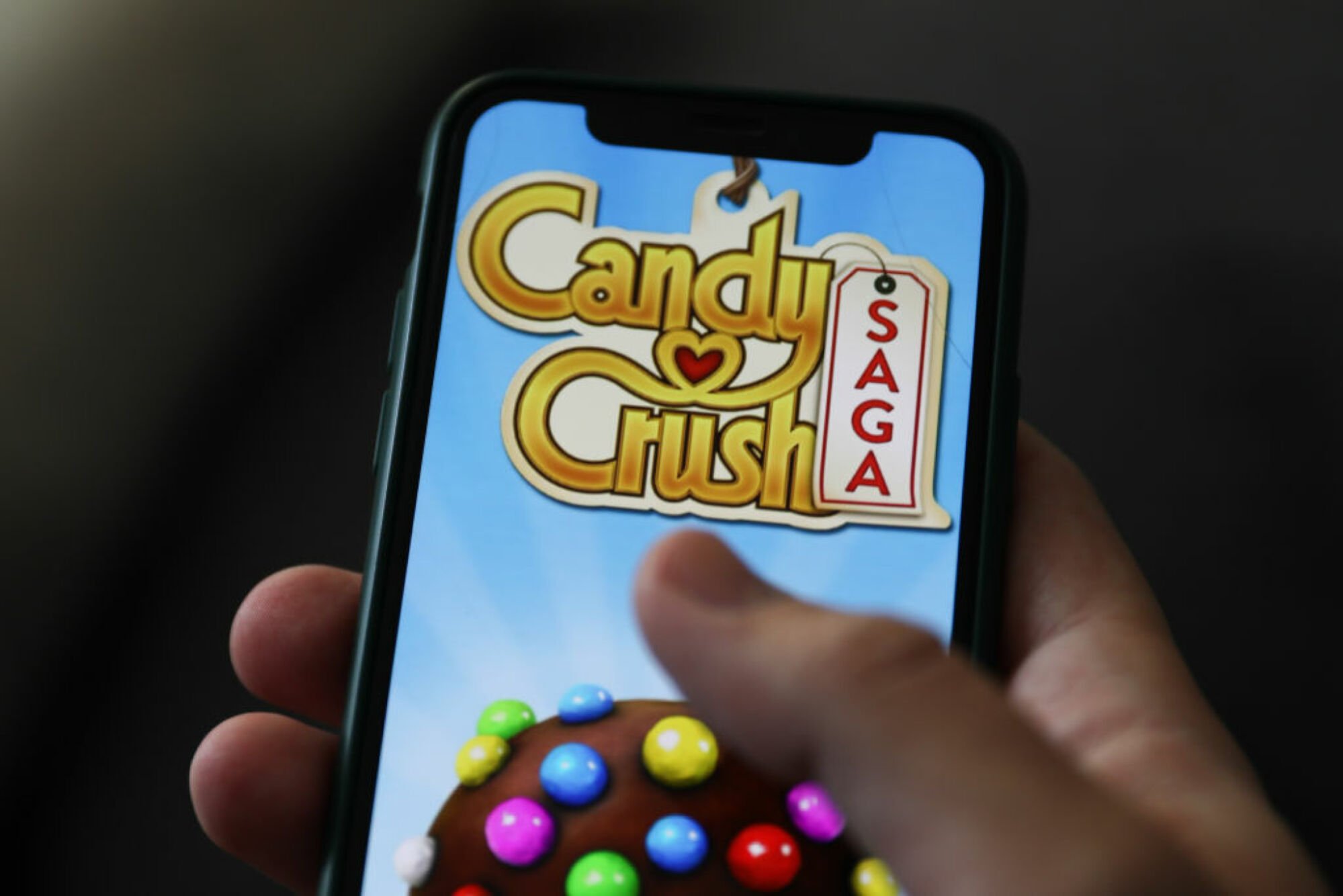 Candy Crush Saga on smartphone screen