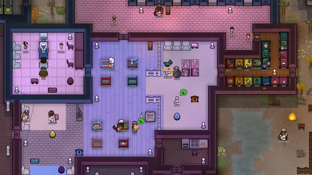A player’s nursery, with an adult taking care of smaller colonists, in Rimworld