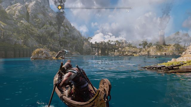 Kratos, Atreus, and Mimir travel Svartalfheim by boat in God of War Ragnarök