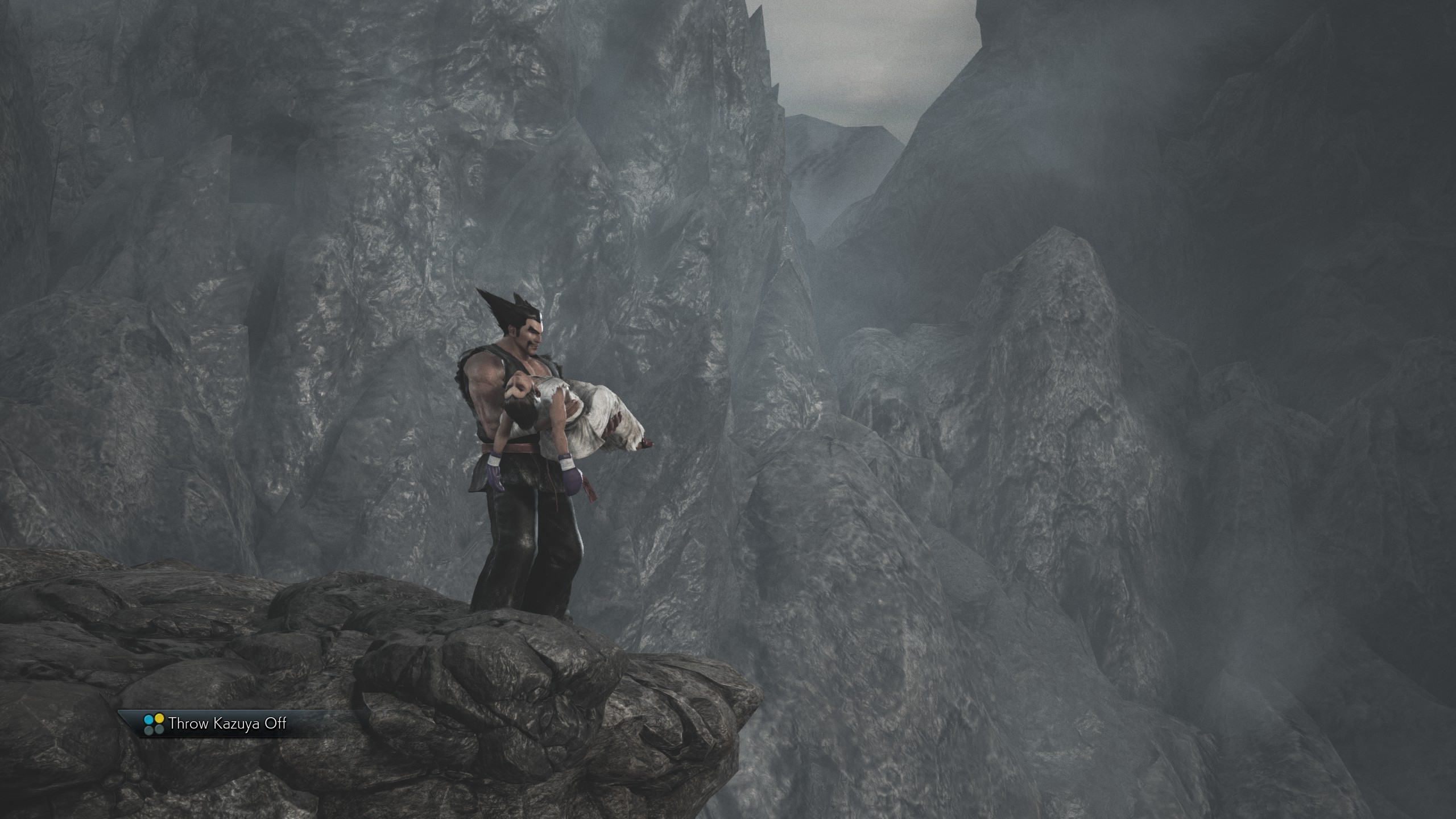 A button prompt urges Heihachi to throw Kazuya off a cliff