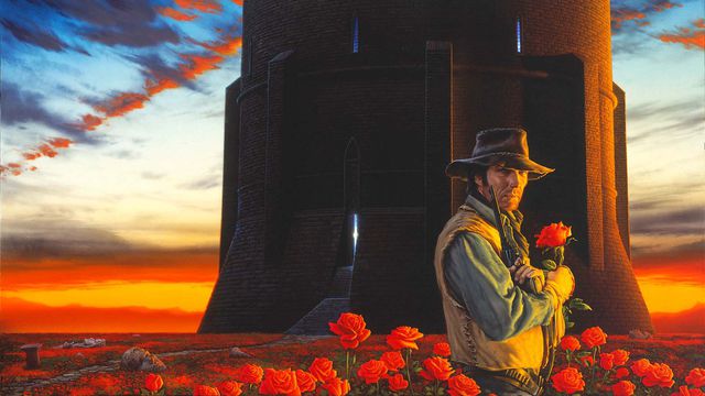 Roland from the Dark Tower stands with a rose in his hand and a cowboy hat on the cover of The Dark Tower book 7