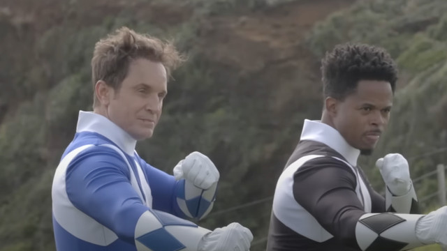 Billy and Zack, the Blue and Black Rangers, pose in costume without their helmets in the Netflix special Power Rangers: Once and Always