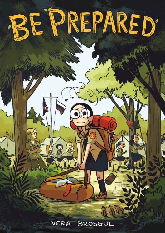 The book cover for "Be Prepared." An illustration of a girl with dark hair and glasses standing in the woods. She is wearing a camp uniform and lugging a large duffel bag.